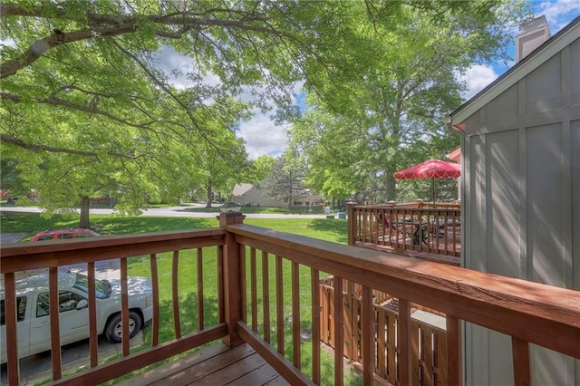 12136 Hayes St, Overland Park, KS 66213 - wooden terrace featuring a lawn
