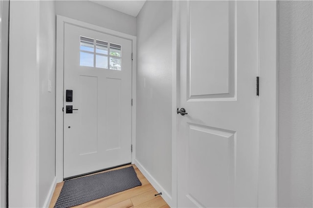 252 SE 23rd Hwy, Knob Noster, MO 65336 - doorway to outside with light wood-style flooring and baseboards