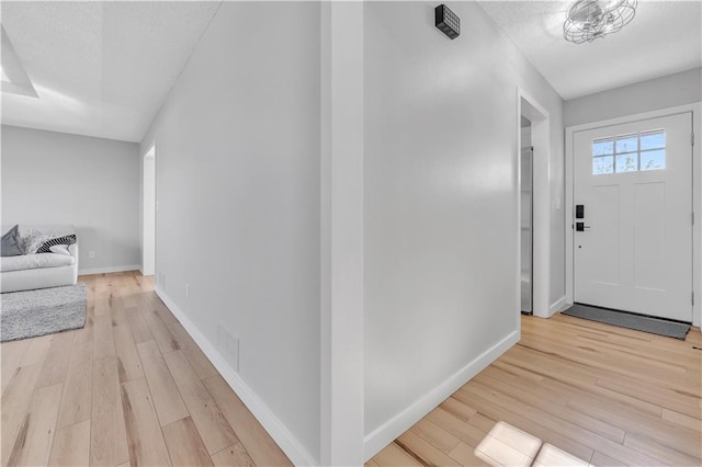252 SE 23rd Hwy, Knob Noster, MO 65336 - entrance foyer featuring light wood-type flooring and baseboards