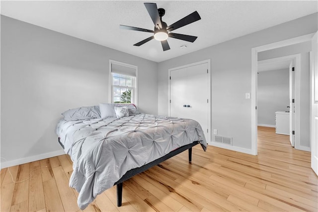 252 SE 23rd Hwy, Knob Noster, MO 65336 - bedroom featuring light wood-type flooring, baseboards, and a ceiling fan