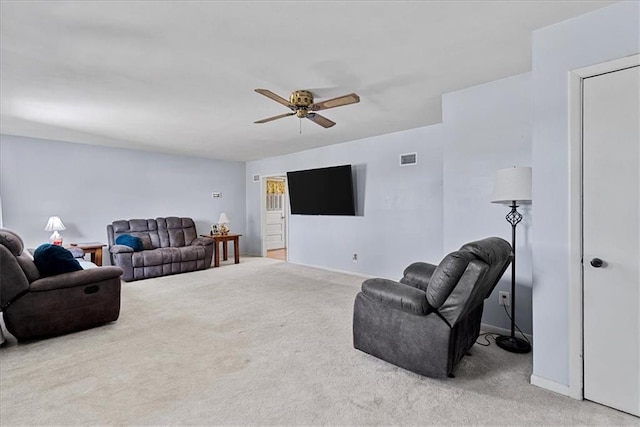 4305 Doctor Greaves Rd, Grandview, MO 64030 - carpeted living room featuring ceiling fan and baseboards