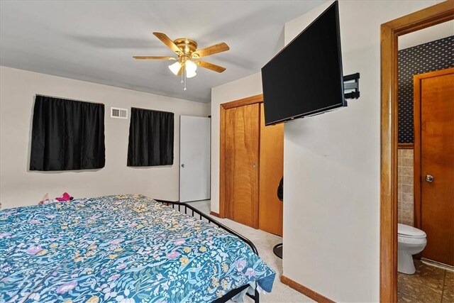 4305 Doctor Greaves Rd, Grandview, MO 64030 - bedroom featuring a closet and a ceiling fan