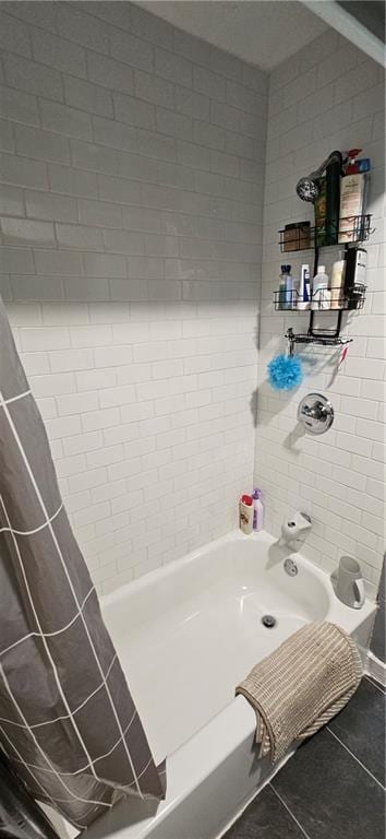 708 S Gay St, Holden, MO 64040 - full bathroom with tile patterned flooring and shower / tub combo