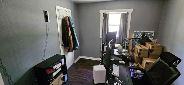 708 S Gay St, Holden, MO 64040 - miscellaneous room with dark wood finished floors and baseboards