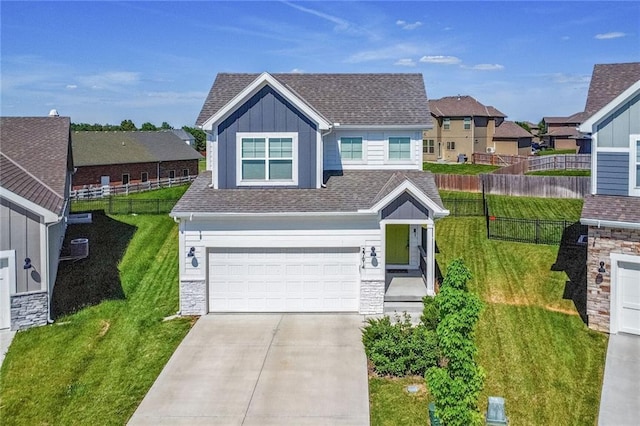 view of front facade featuring board and batten siding, stone siding, driveway, an attached garage, and a shingled roof