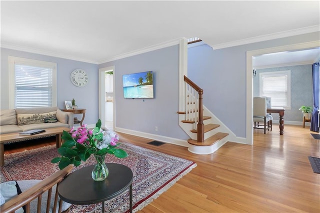 23 W Winthrope Rd, Kansas City, MO 64113 - living area featuring stairway, light wood-style floors, ornamental molding, and baseboards