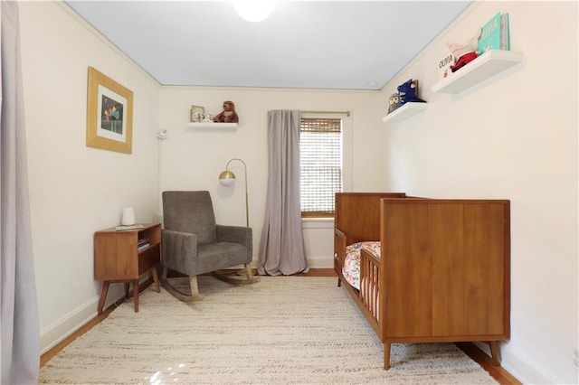 23 W Winthrope Rd, Kansas City, MO 64113 - sitting room featuring wood finished floors and baseboards