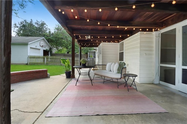 23 W Winthrope Rd, Kansas City, MO 64113 - view of patio featuring fence, an outdoor structure, and french doors