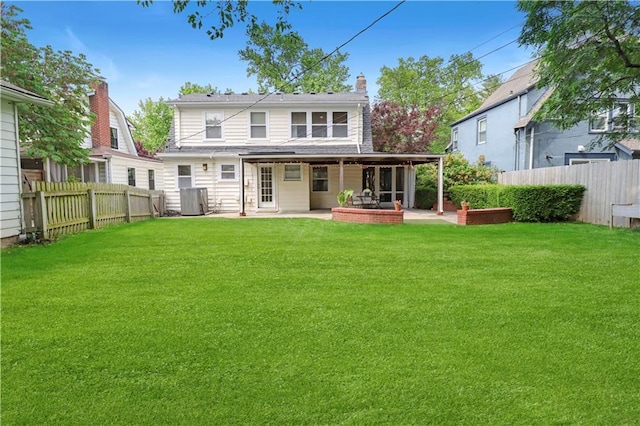23 W Winthrope Rd, Kansas City, MO 64113 - rear view of property featuring a patio, a chimney, and central AC unit