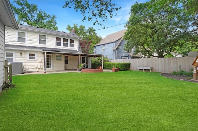 23 W Winthrope Rd, Kansas City, MO 64113 - view of yard featuring a patio and central AC unit