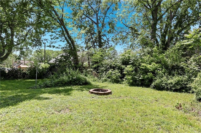 2414 N 12th St, Kansas City, KS 66104 - view of green lawn with a fire pit