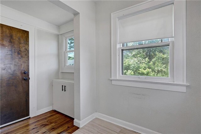 2414 N 12th St, Kansas City, KS 66104 - entrance foyer featuring baseboards and wood finished floors