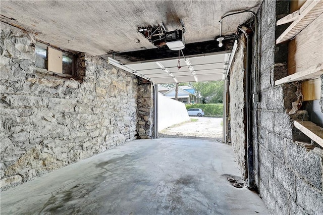 2414 N 12th St, Kansas City, KS 66104 - garage featuring a garage door opener