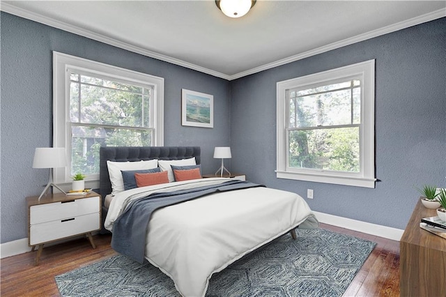 2414 N 12th St, Kansas City, KS 66104 - bedroom featuring multiple windows, wood-type flooring, crown molding, baseboards, and a textured wall