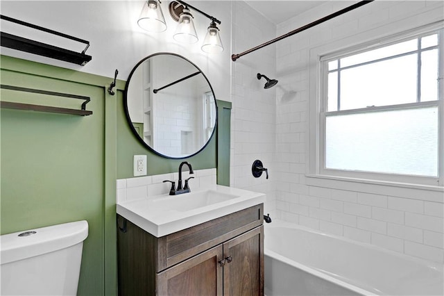 2414 N 12th St, Kansas City, KS 66104 - full bathroom featuring shower / bath combination, toilet, and vanity