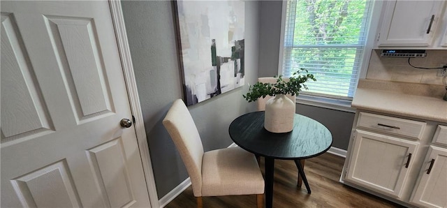 7934 Hemlock St, Overland Park, KS 66204 - dining space featuring dark wood-style flooring and baseboards