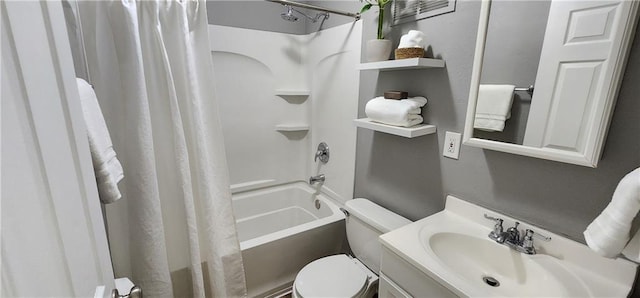 7934 Hemlock St, Overland Park, KS 66204 - full bath featuring shower / bath combo with shower curtain, toilet, and vanity