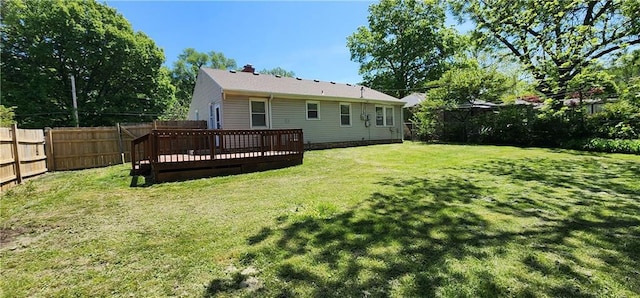 7934 Hemlock St, Overland Park, KS 66204 - back of house with a wooden deck and a chimney