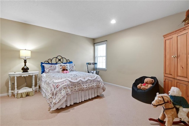 bedroom with carpet, baseboards, and recessed lighting