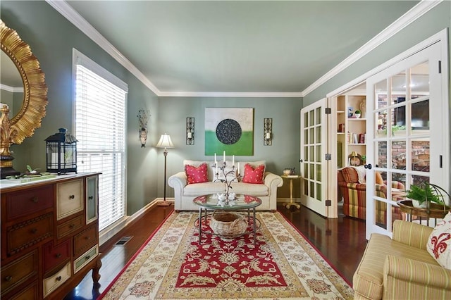 living area featuring french doors, wood finished floors, baseboards, and ornamental molding
