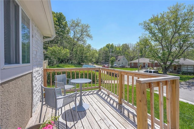 3118 Kimball Ave, Kansas City, KS 66104 - wooden deck featuring a residential view