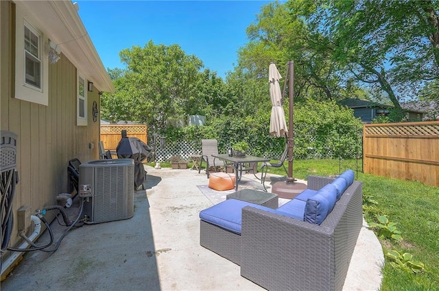 3118 Kimball Ave, Kansas City, KS 66104 - view of patio / terrace with cooling unit, fence, outdoor lounge area, and outdoor dining space