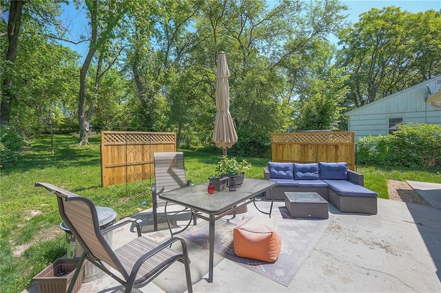 3118 Kimball Ave, Kansas City, KS 66104 - view of patio with an outdoor living space, outdoor dining space, and view of scattered trees