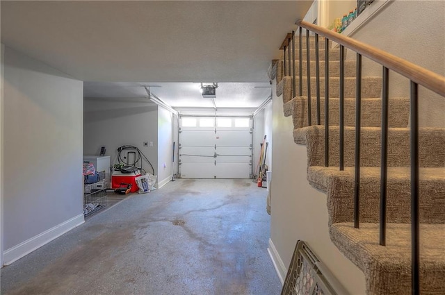 3118 Kimball Ave, Kansas City, KS 66104 - garage with a garage door opener and baseboards