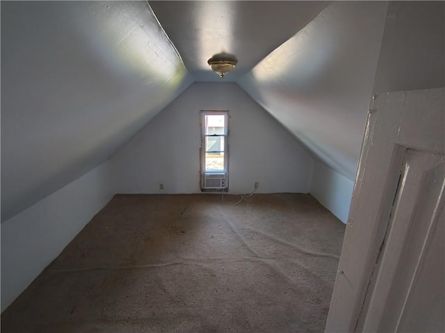 bonus room with vaulted ceiling, carpet floors, and cooling unit