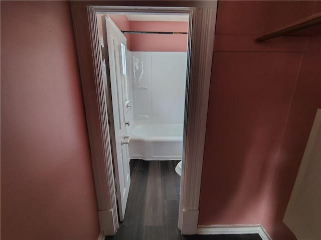 hallway featuring wood finished floors