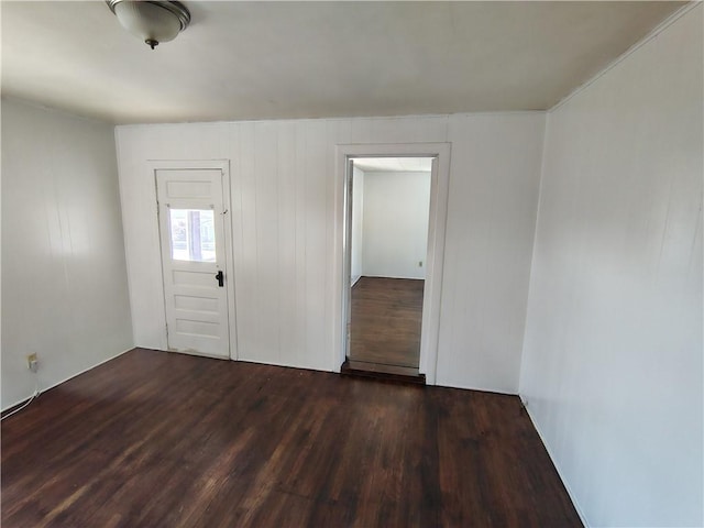 entryway with wood finished floors