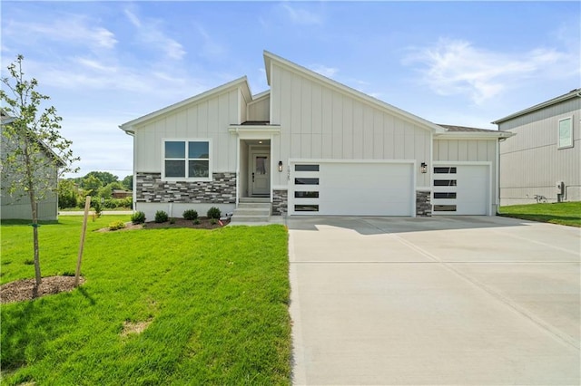 1925 SW Merryman Dr, Lees Summit, MO 64082 - view of front facade featuring board and batten siding, an attached garage, and stone siding