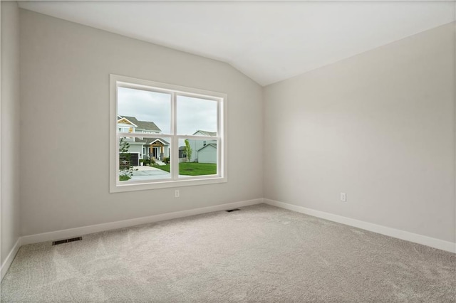 1925 SW Merryman Dr, Lees Summit, MO 64082 - carpeted spare room with baseboards and lofted ceiling
