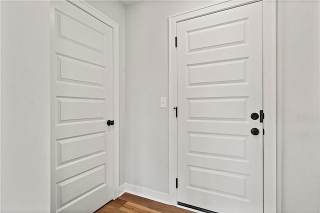 1925 SW Merryman Dr, Lees Summit, MO 64082 - entryway featuring dark wood-style floors and baseboards