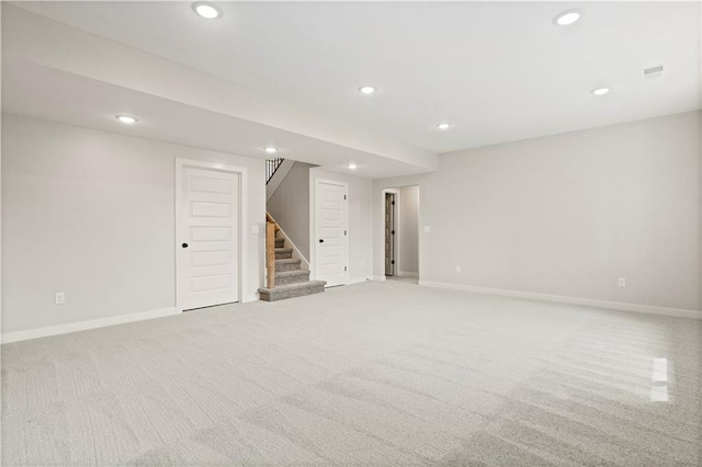 1925 SW Merryman Dr, Lees Summit, MO 64082 - finished basement with light carpet, stairs, recessed lighting, and baseboards