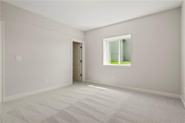 1925 SW Merryman Dr, Lees Summit, MO 64082 - spare room with carpet floors and baseboards