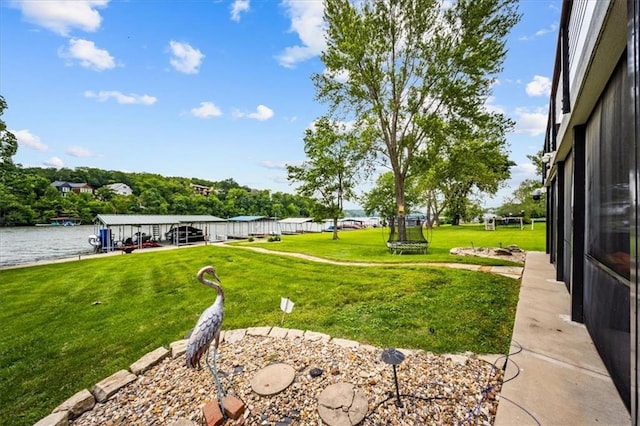 19P Lake Shore Dr, Lake Lotawana, MO 64086 - view of grassy yard featuring a water view