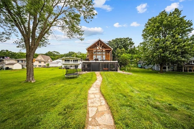 19P Lake Shore Dr, Lake Lotawana, MO 64086 - view of green lawn with a sunroom