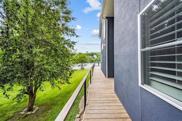 19P Lake Shore Dr, Lake Lotawana, MO 64086 - view of side of property featuring stucco siding