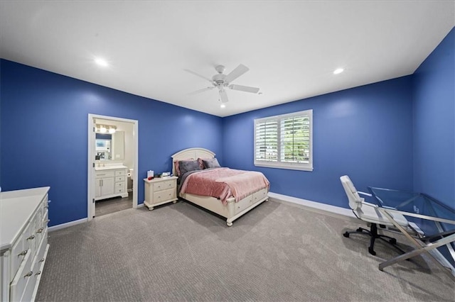 19P Lake Shore Dr, Lake Lotawana, MO 64086 - carpeted bedroom featuring connected bathroom, ceiling fan, and recessed lighting
