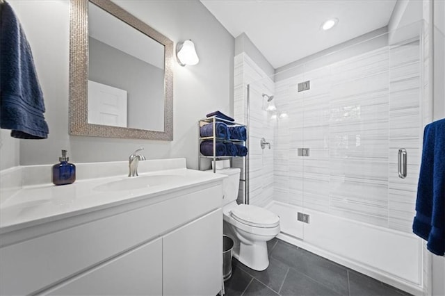 19P Lake Shore Dr, Lake Lotawana, MO 64086 - bathroom featuring a shower stall, vanity, tile patterned floors, and recessed lighting