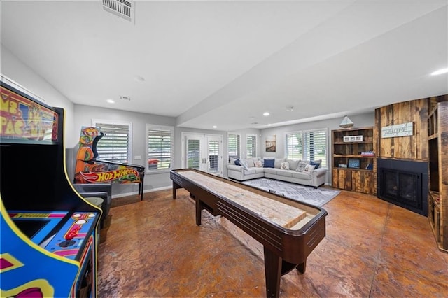 19P Lake Shore Dr, Lake Lotawana, MO 64086 - rec room with a large fireplace, recessed lighting, and french doors