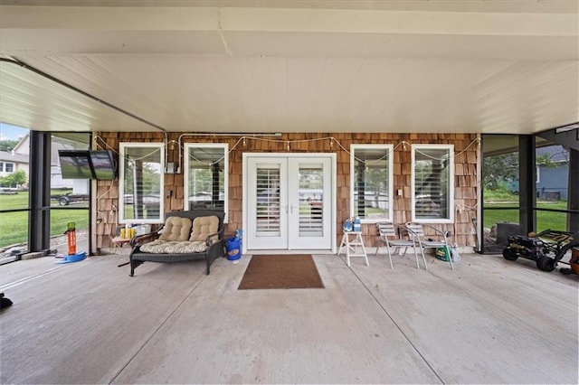 19P Lake Shore Dr, Lake Lotawana, MO 64086 - sunroom with french doors and healthy amount of natural light