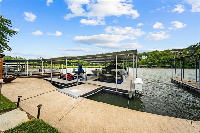 19P Lake Shore Dr, Lake Lotawana, MO 64086 - dock area with boat lift and a water view