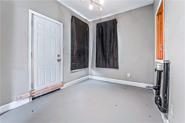 218 S 8th St, Kansas City, KS 66101 - foyer with finished concrete flooring and baseboards