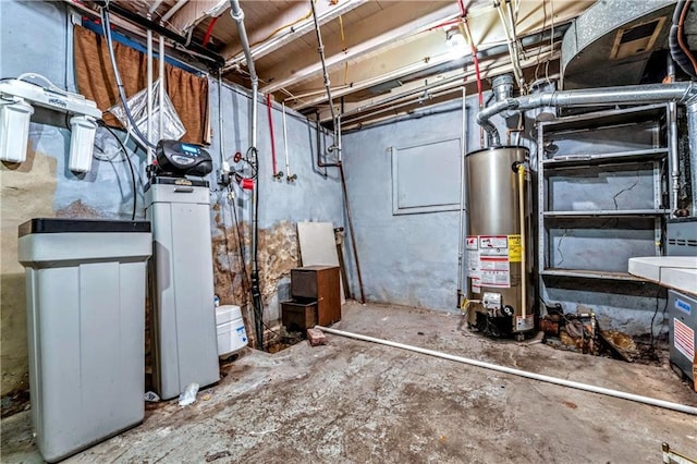 218 S 8th St, Kansas City, KS 66101 - unfinished basement featuring water heater