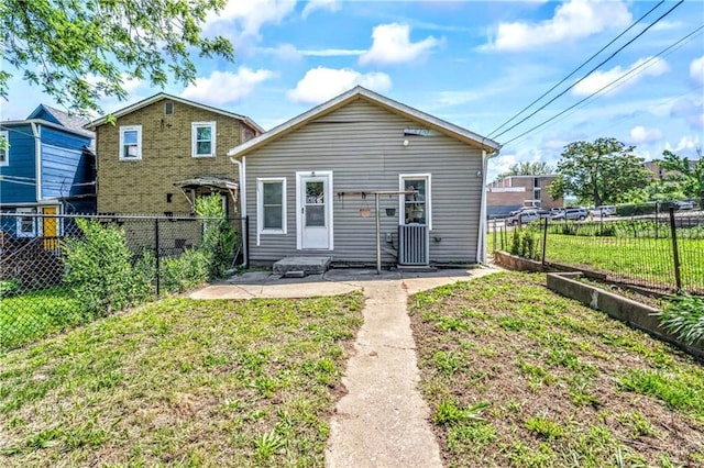 218 S 8th St, Kansas City, KS 66101 - back of property with central AC unit