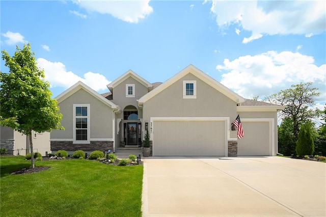 view of front of house featuring stone siding, stucco siding, concrete driveway, and a garage