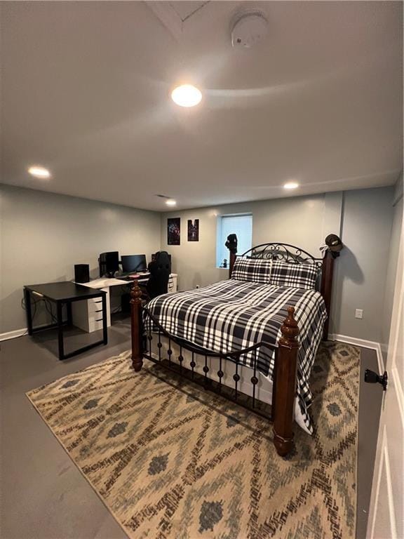 bedroom featuring baseboards, recessed lighting, and a desk