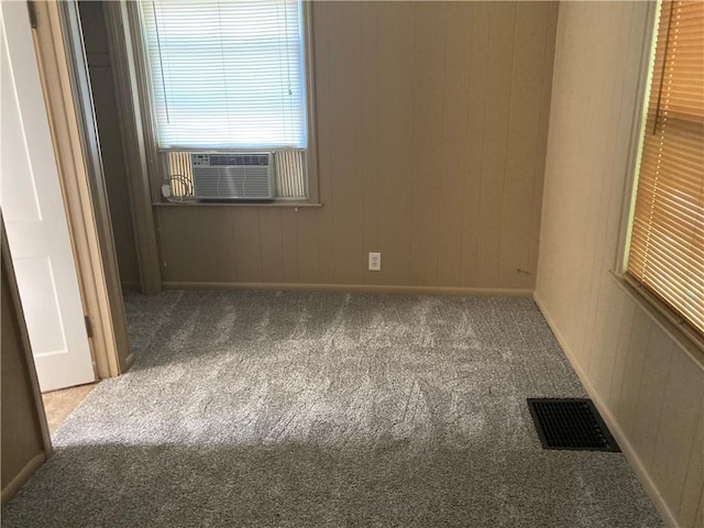 121 S Willis Ave, Independence, MO 64050 - spare room featuring carpet flooring, baseboards, and cooling unit